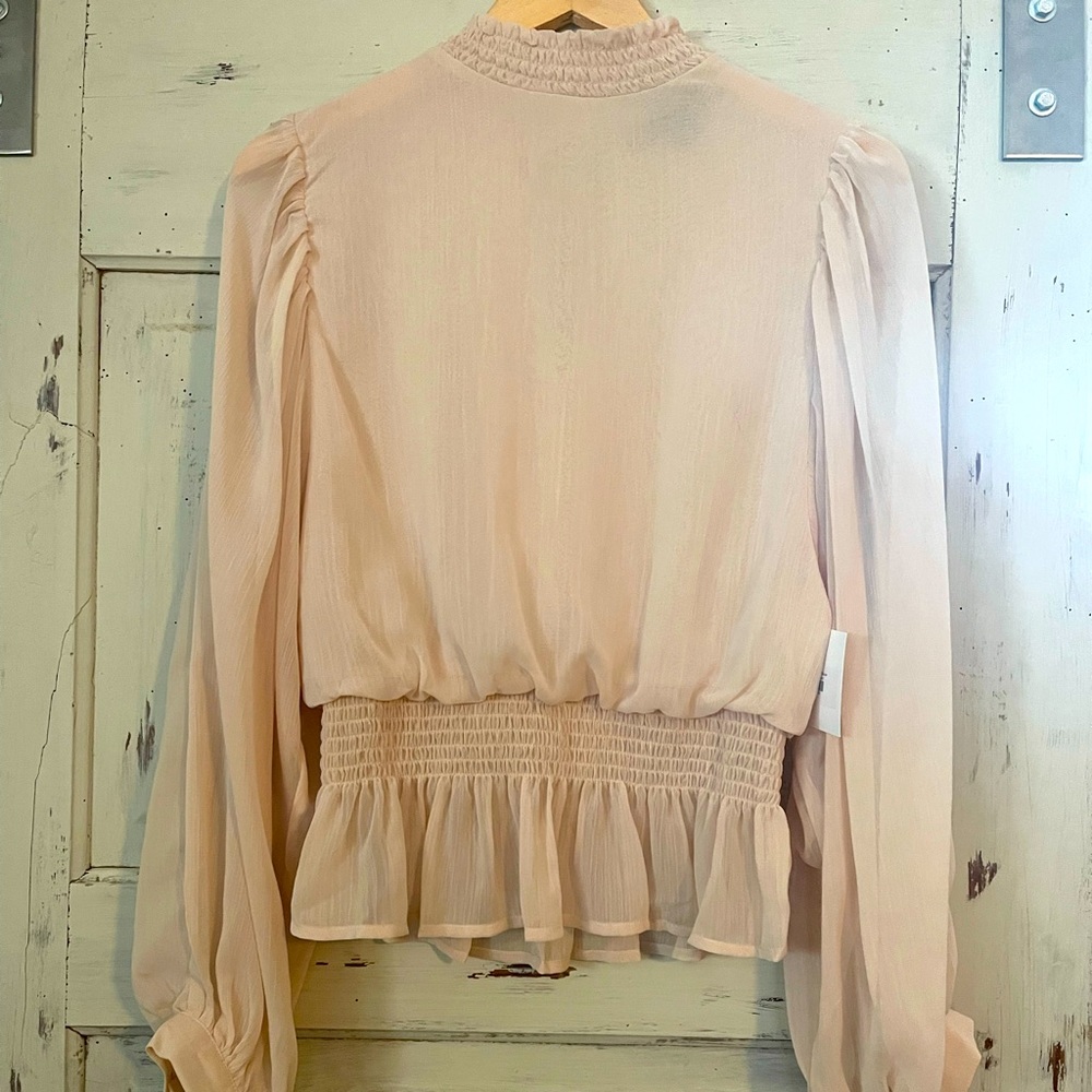 Adorable cream puffy sleeve peplum blouse
